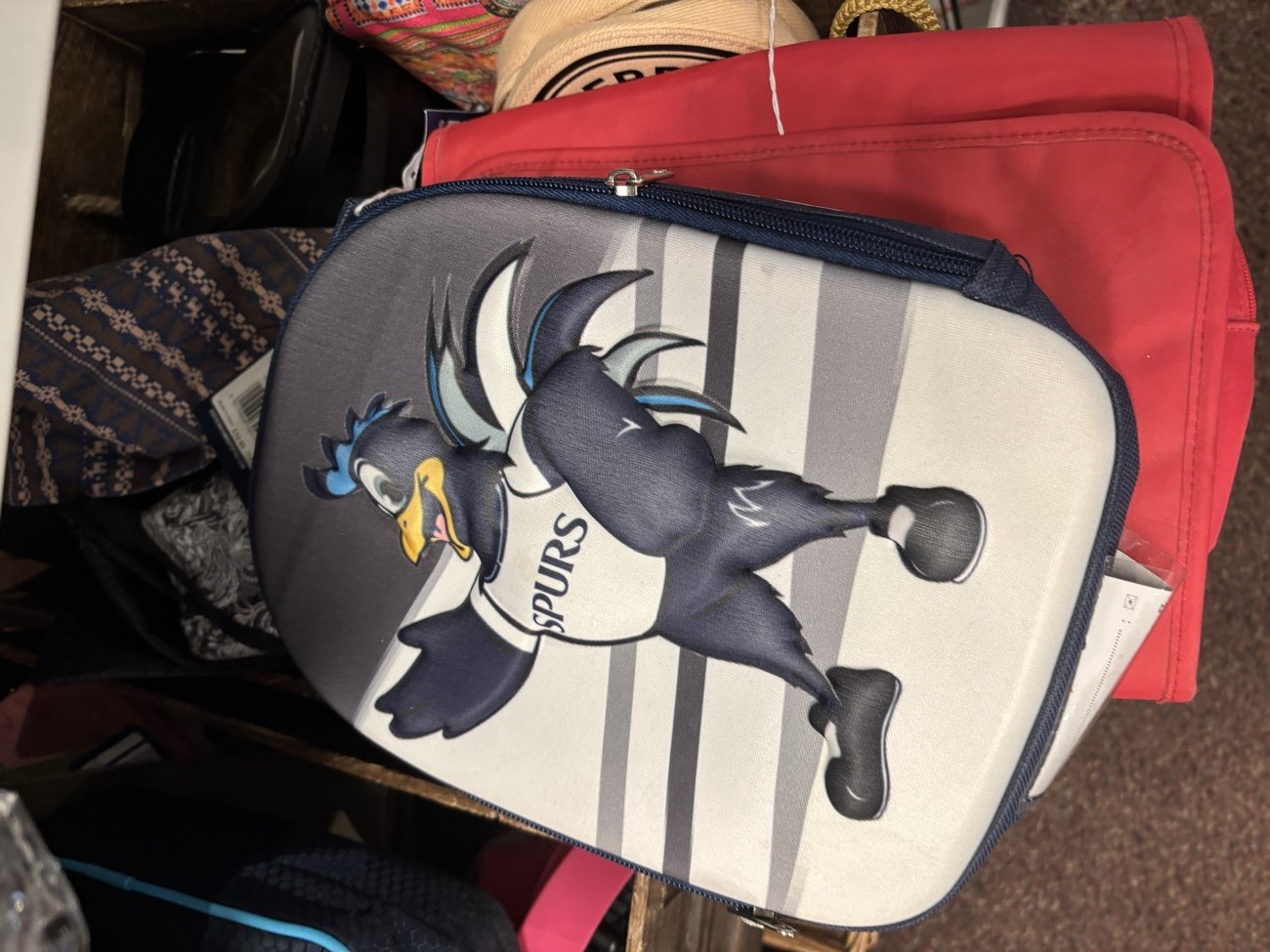 Spurs school bag product bought at St Vincent's Hackney
