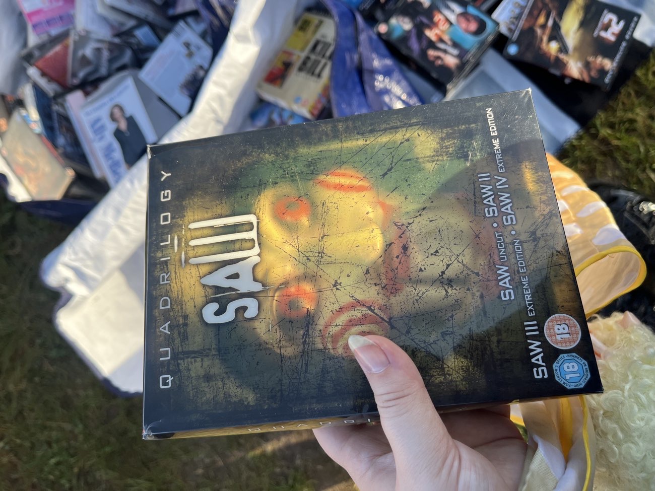 Saw Quadrilogy box set (this was so cool but left it behind as we already own all the movies) bought at Car boot sale for £2.00