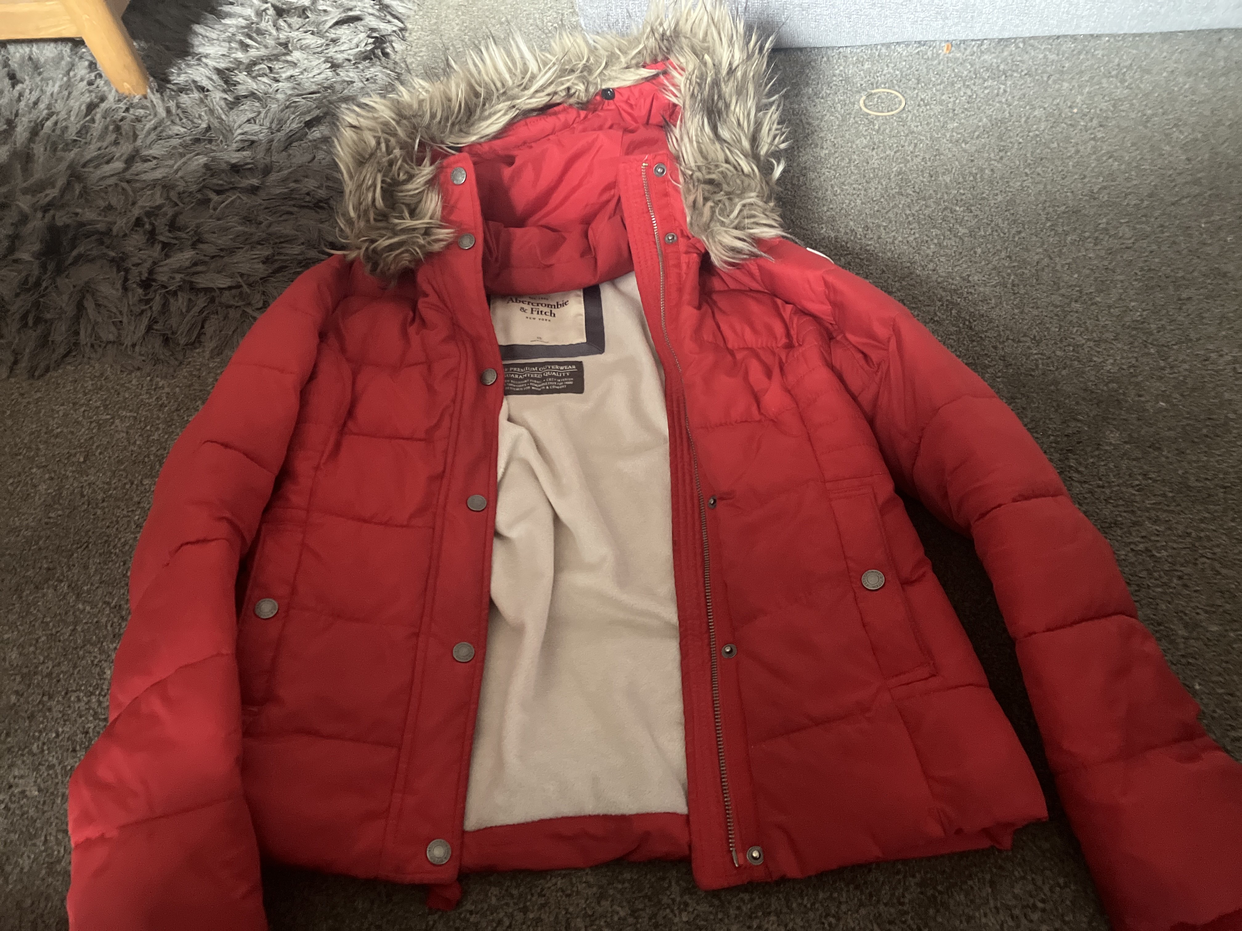 A&F red waterproof jacket bought at The Salvation Army for £10.00