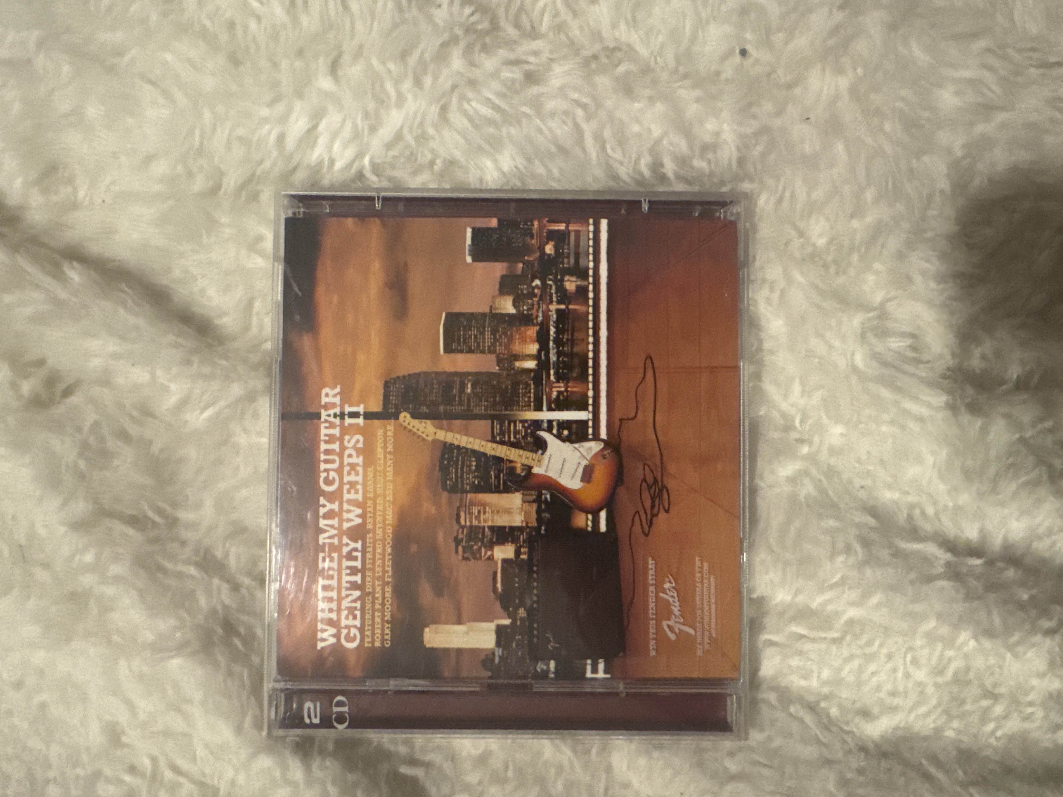 While My Guitar Gently Weeps CD bought at Havens Hospices for £1.00