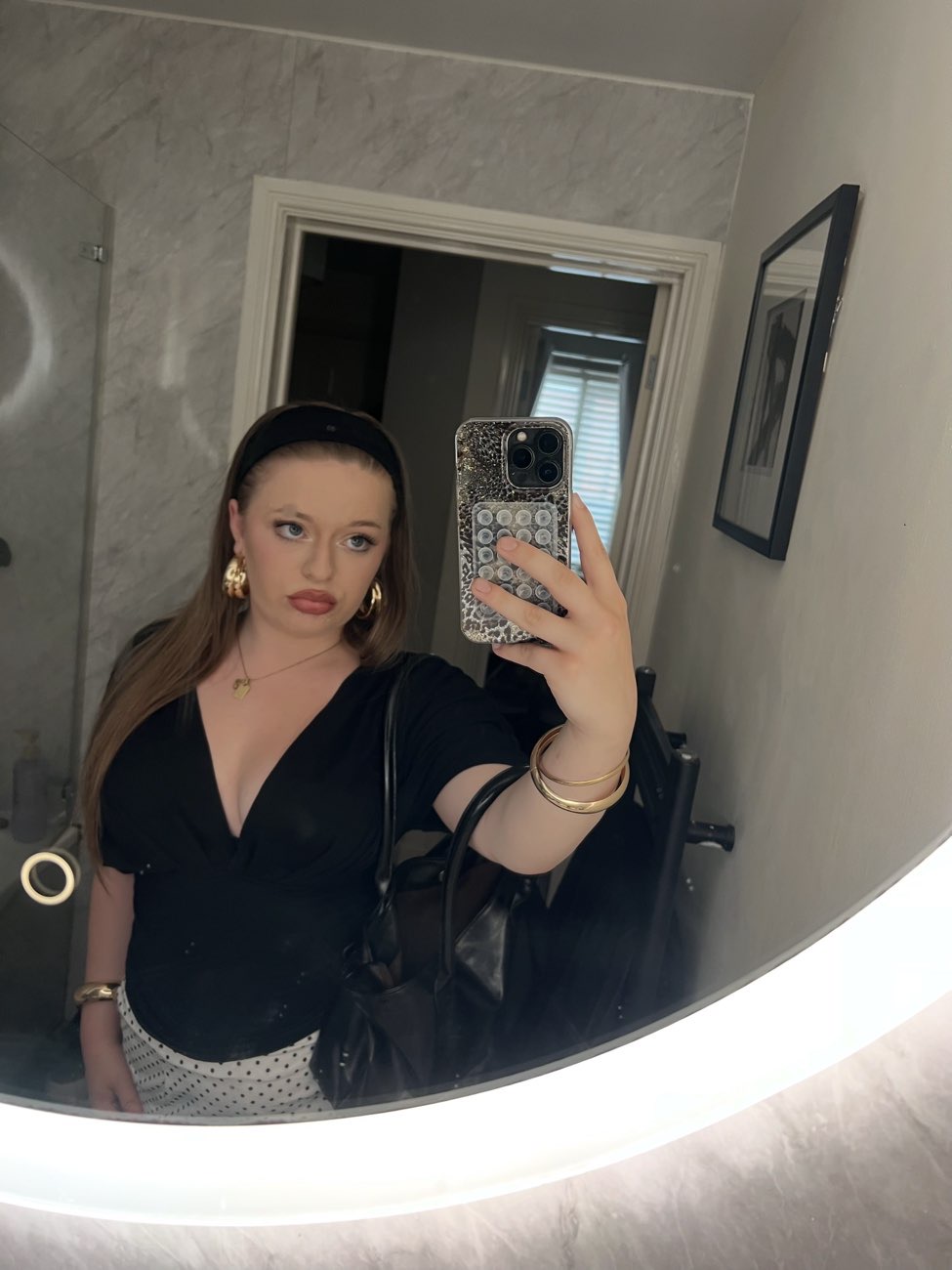 Black low cut top bought at British Heart Foundation for £1.50
