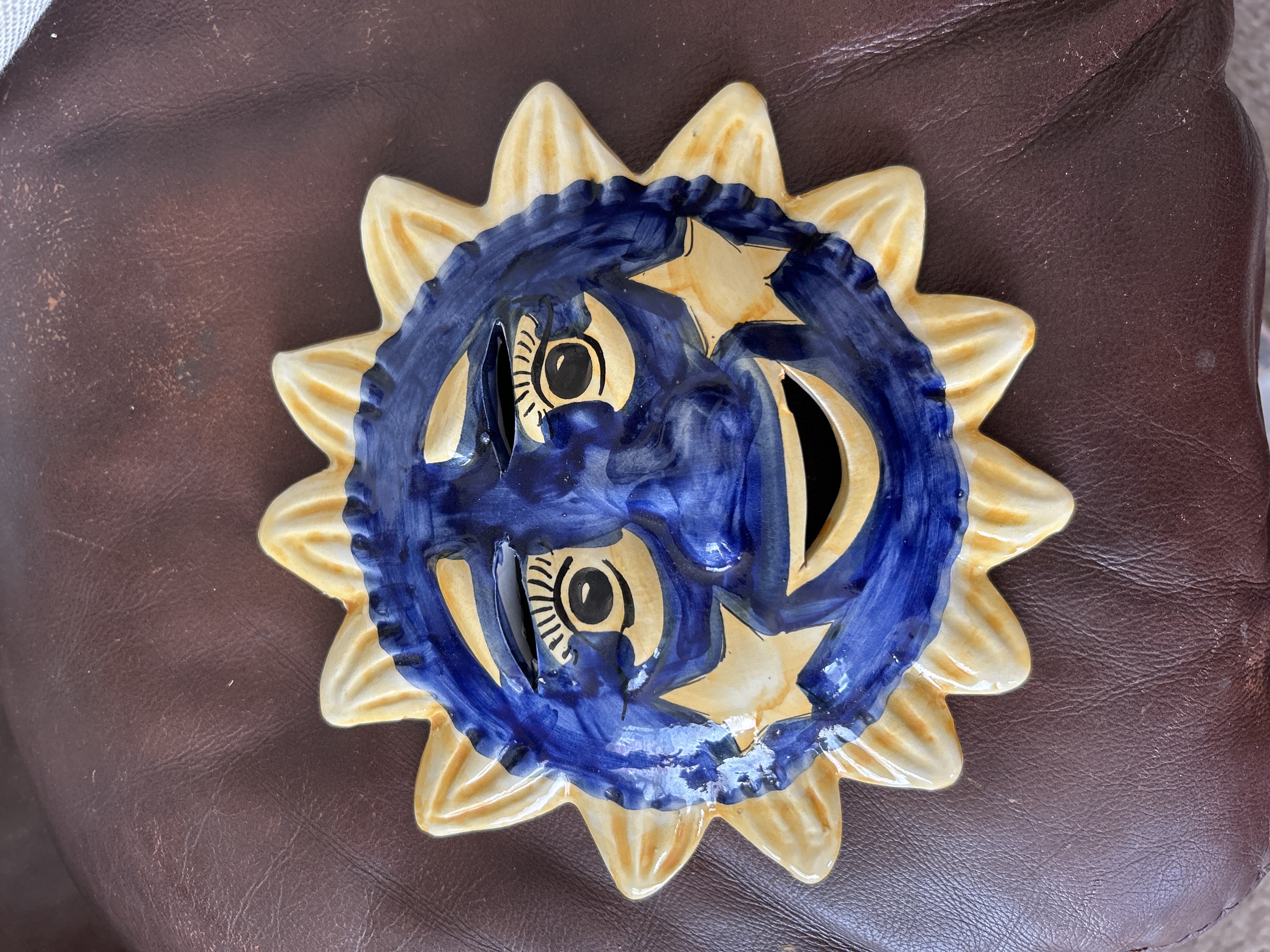 vintage celestial ceramic sun wall hanging product bought at Oxfam Shop for £2.00