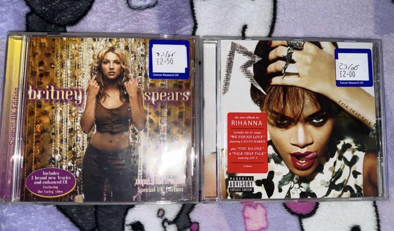 Rihanna and Britney Spears CDs product bought at Cancer Research UK for £4.50