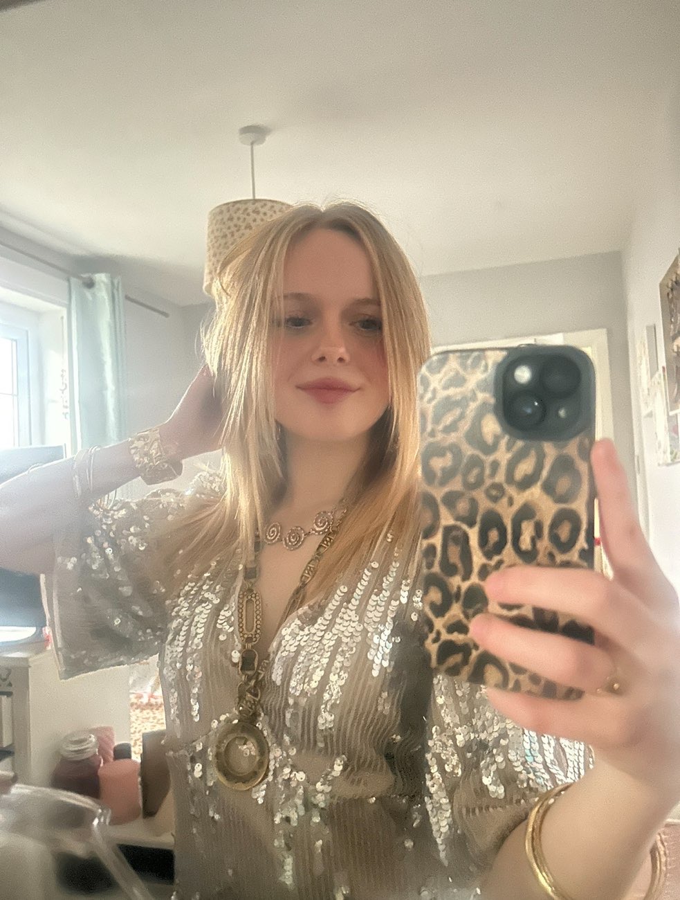 silver/gold sequin top bought at Scope