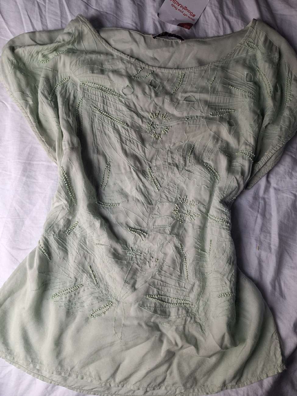 Cute green top and a black belt with quite a big buckle. Got the belt for half price as it was a bit damaged x bought at British Heart Foundation for £8.50