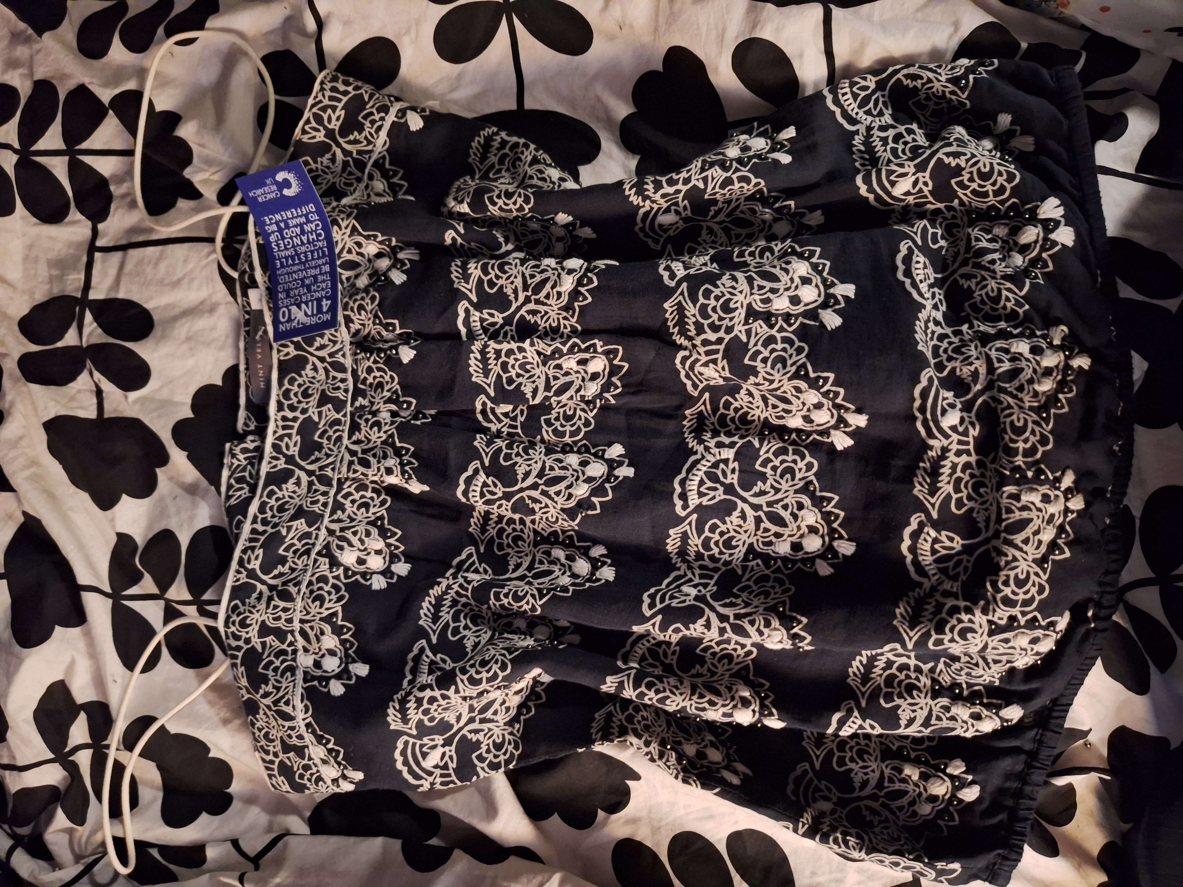 Mint velvet top and a cute mini summer dress x bought at Cancer Research UK for £20.00