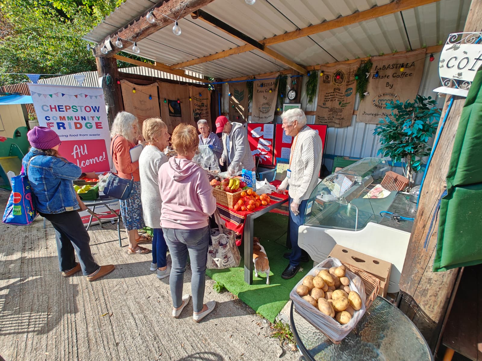 Community fridge at a UK charity shop in Chepstow, where local volunteers share surplus food to reduce waste and support the community.