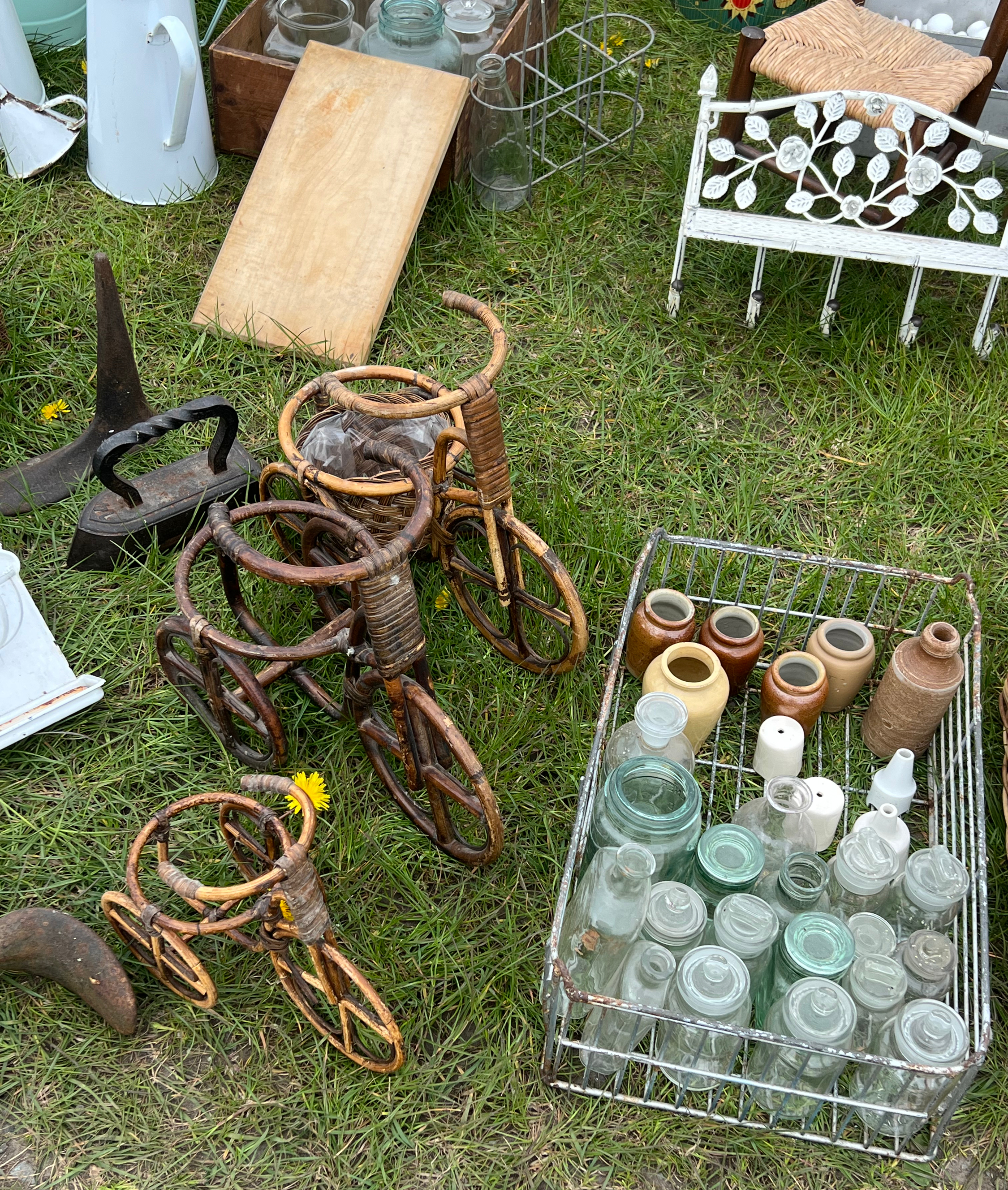 Wicker bike plant pot holders and a selection of glass and pot jars