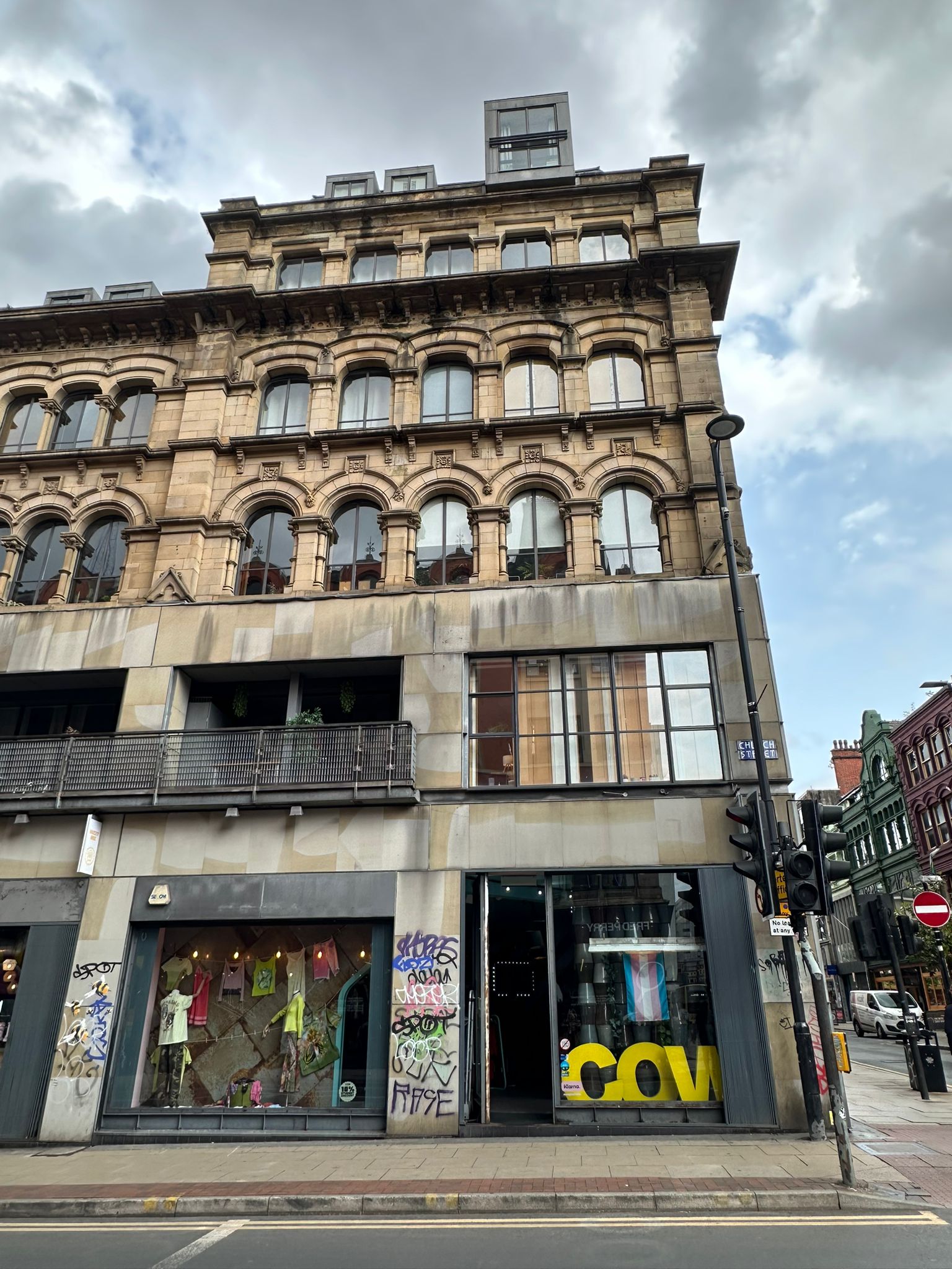 A picture of the entrance of Cow vintage shop in the center of Manchester