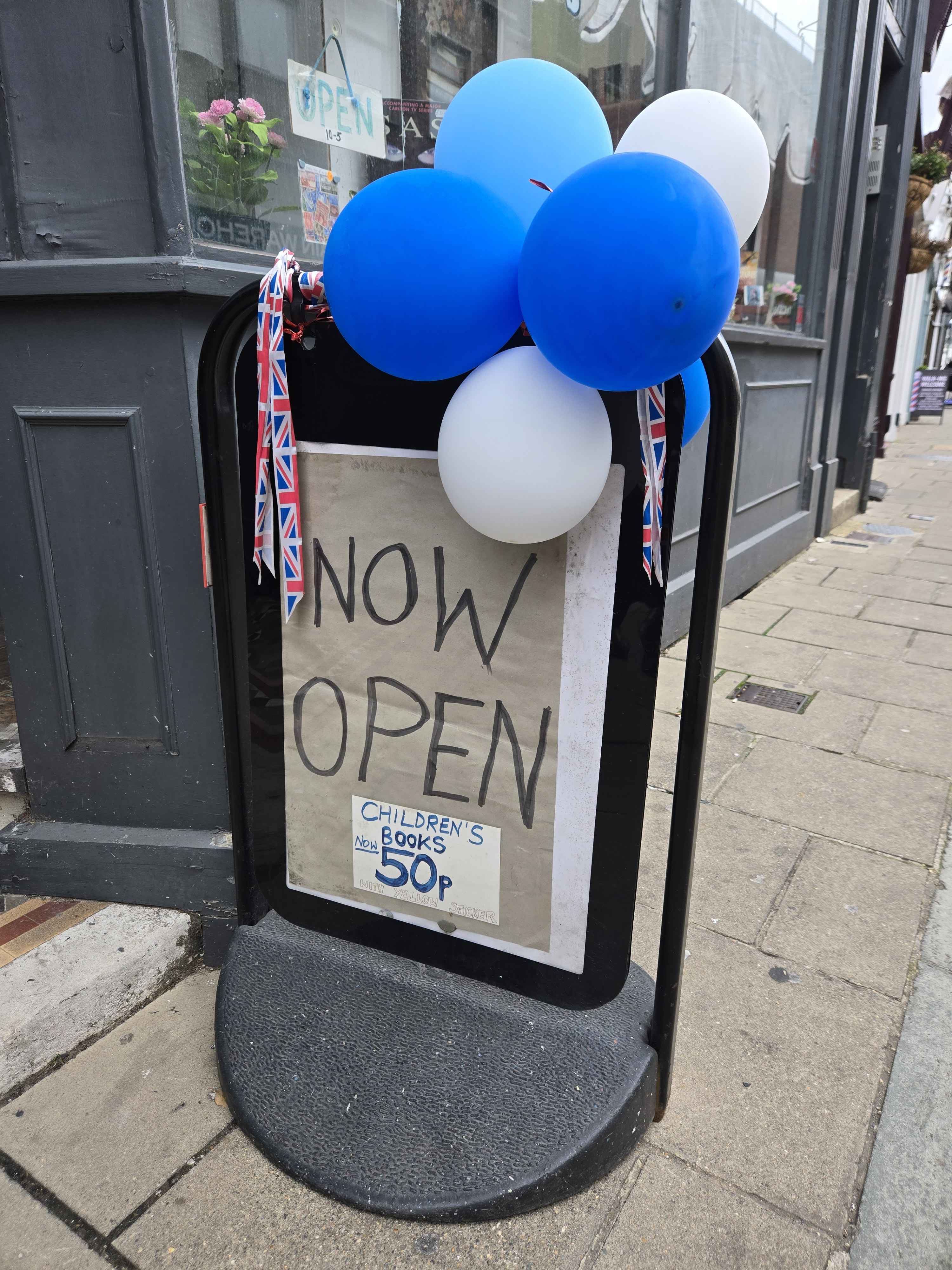A 'Now Open' Display Containing Balloons Outside the Little Nook Bookstore on the Isle of Wight