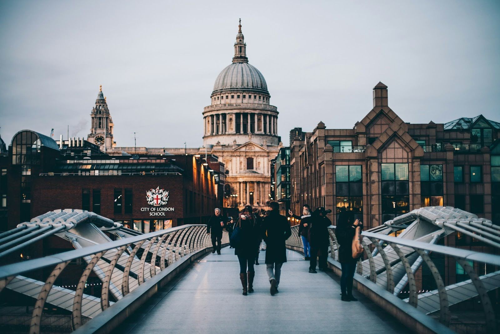 A bustling street in London next to the City of London School and St Paul's Cathedral