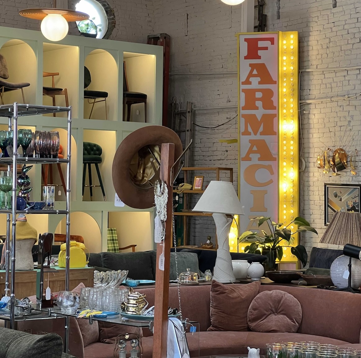 An old furniture thrift store packed with old tables, chairs, and so much more