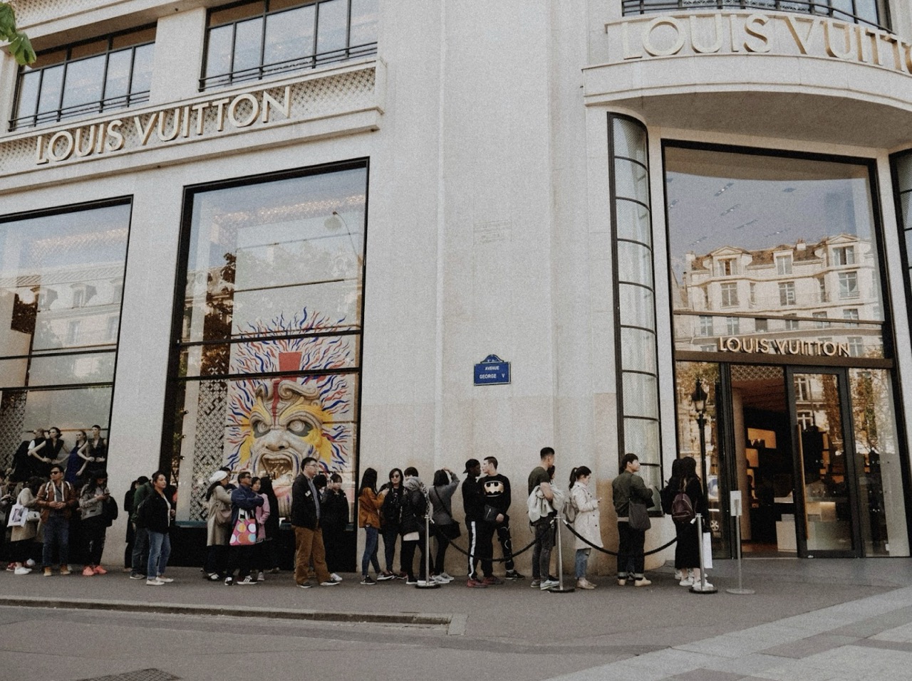 A huge queue forms outside a French Louis Vuitton store, something most shoppers wouldn’t want anything to do with