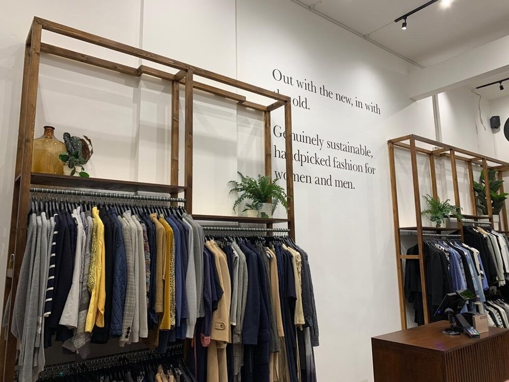 Good London's interior. A quote on the wall says, 'Out with the new, in with the old'