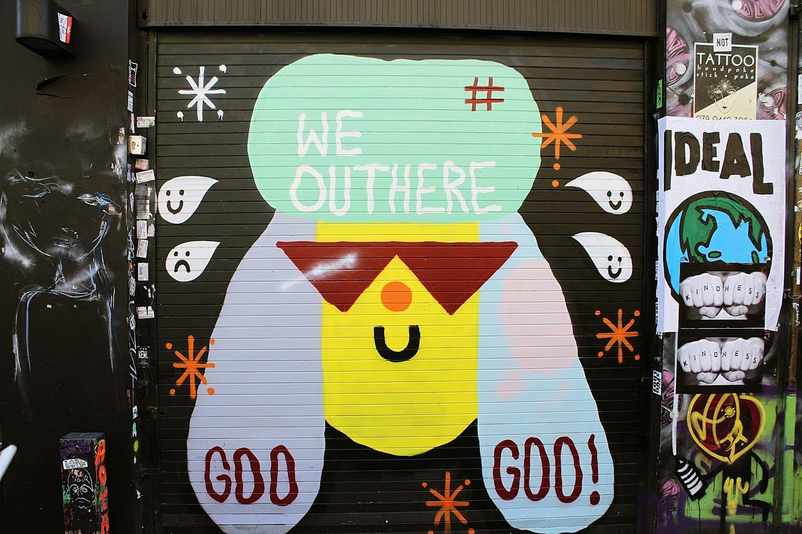 Shoreditch street art of a long-eared animal wearing sunglasses that reads ‘We out here’.