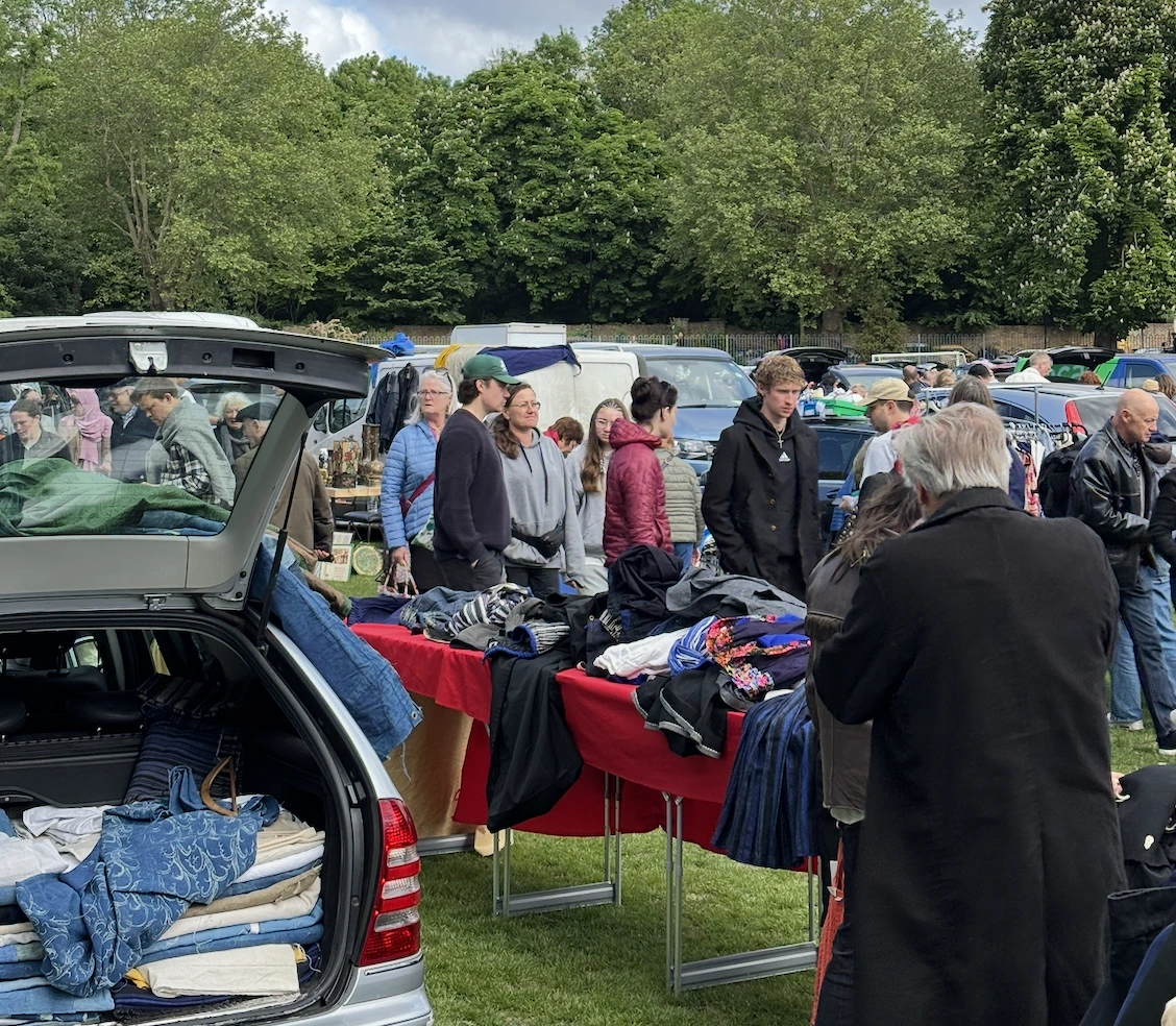 A seller at an outdoor car boot sale in West London