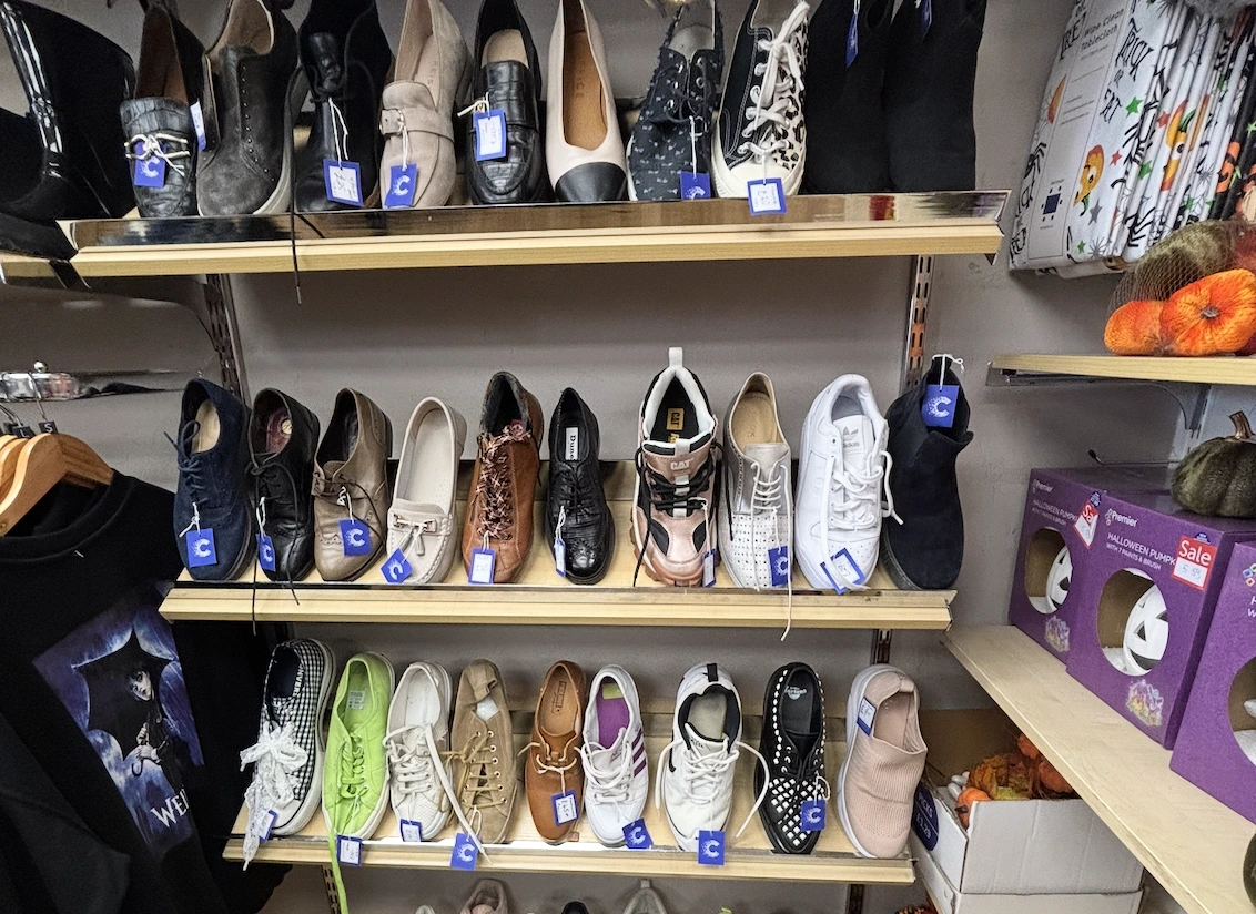 Shoe rails in a charity shop