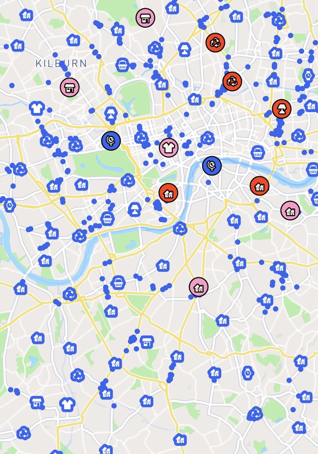 The Ganddee map of central London, dotted with dozens of icons marking nearby second-hand shops, charity shops, clothing stores and events, with several highlighted in pink and red.